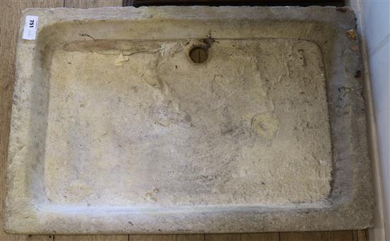 An 18th century limestone sink, 87 x 57cm